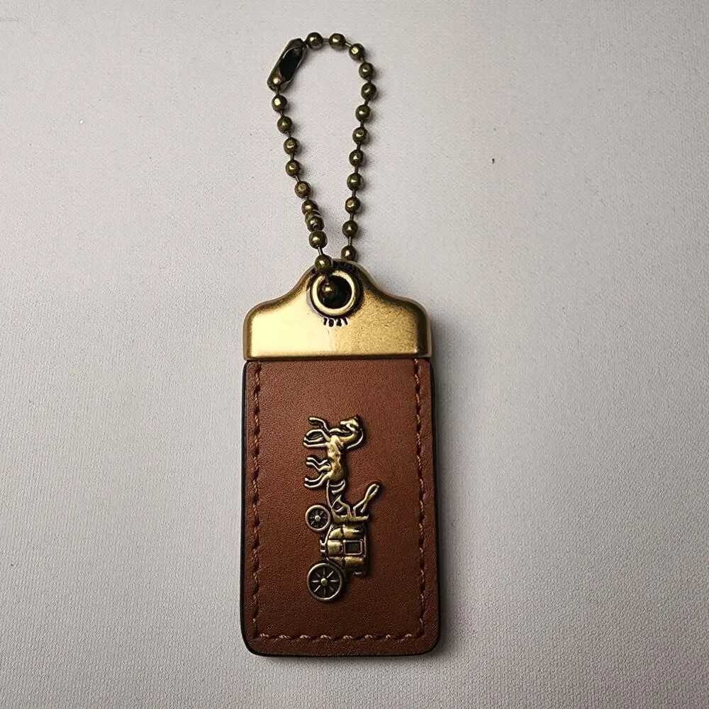 Coach 1941 Horse Carriage Hang Tag Bag Charm - Brass Saddle Multi